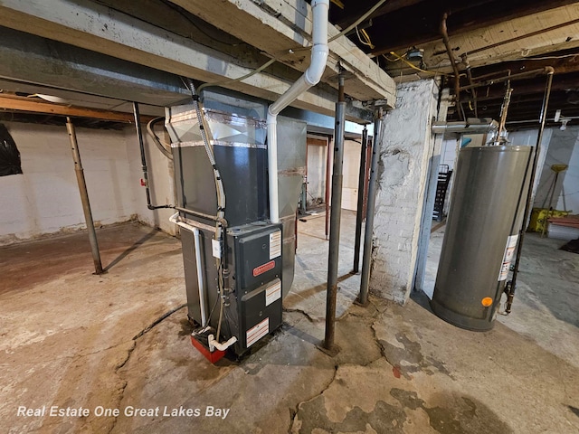 basement with gas water heater and heating unit