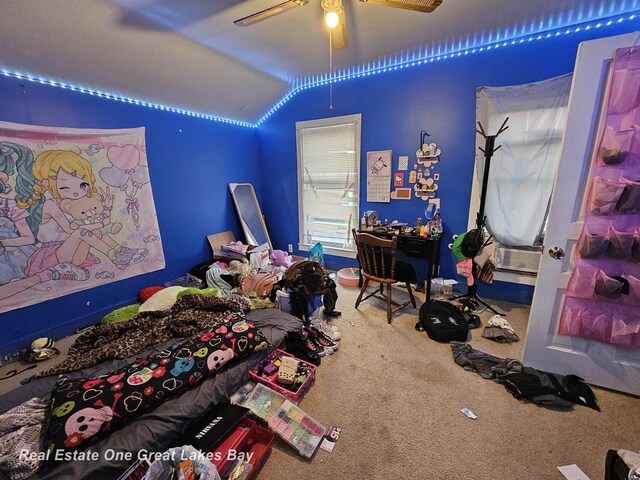 422 N Woodbridge St, Saginaw, MI 48602 - carpeted bedroom with lofted ceiling and ceiling fan