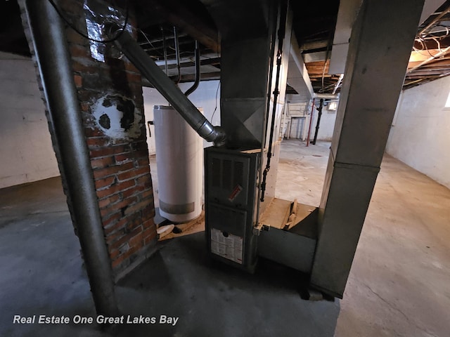 utility room with water heater