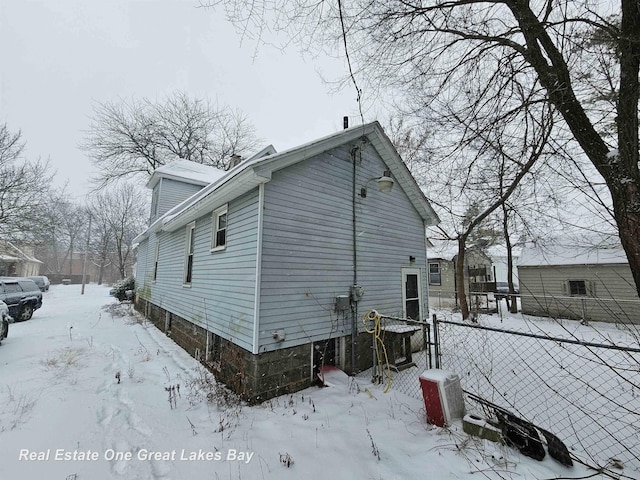 view of snow covered property