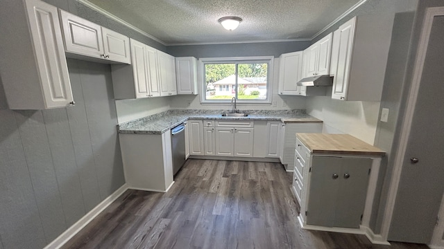 kitchen with white cabinets, butcher block countertops, stainless steel dishwasher, and dark wood-type flooring