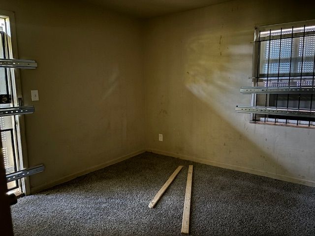 10270 Beaconsfield St, Detroit, MI 48224 - carpeted spare room featuring baseboards