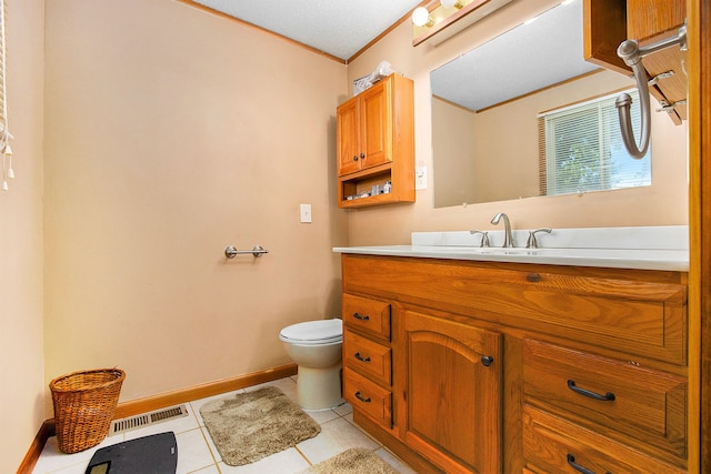 half bath featuring toilet, ornamental molding, visible vents, tile patterned flooring, and vanity