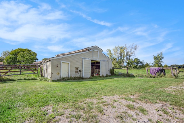 view of outdoor structure with a yard