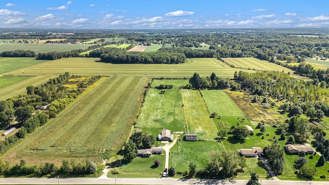 birds eye view of property featuring a rural view