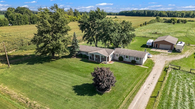 birds eye view of property featuring a rural view