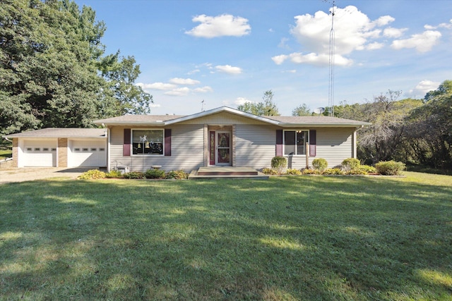 ranch-style home with a front yard and a garage