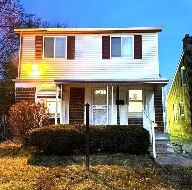 front facade with a porch