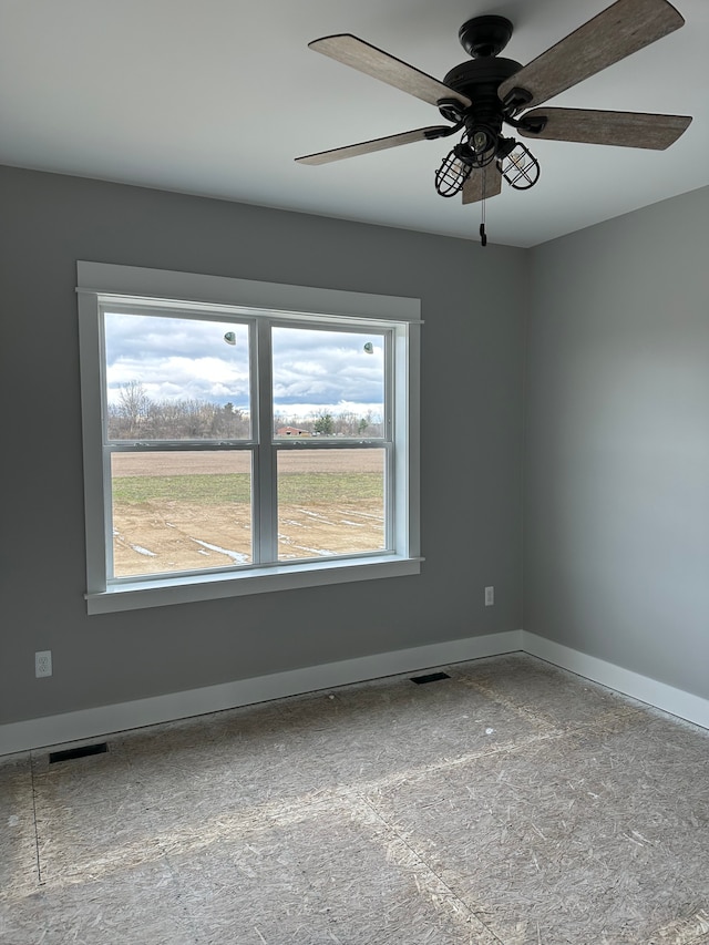 empty room featuring ceiling fan