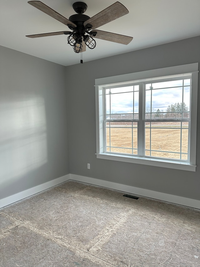 empty room with ceiling fan