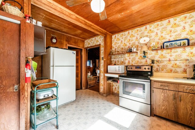 5212 Pier Rd, Coloma, MI 49038 - kitchen featuring white appliances, wood ceiling, light flooring, light countertops, and a ceiling fan