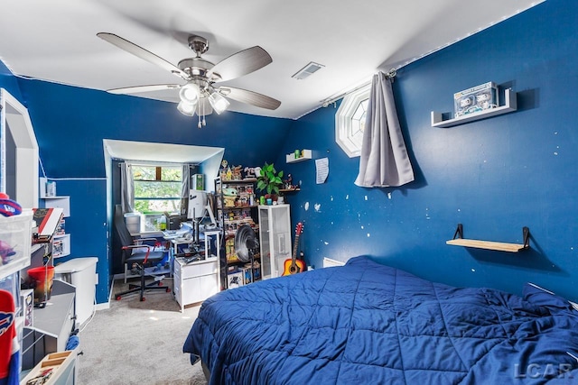 bedroom featuring carpet, vaulted ceiling, and ceiling fan