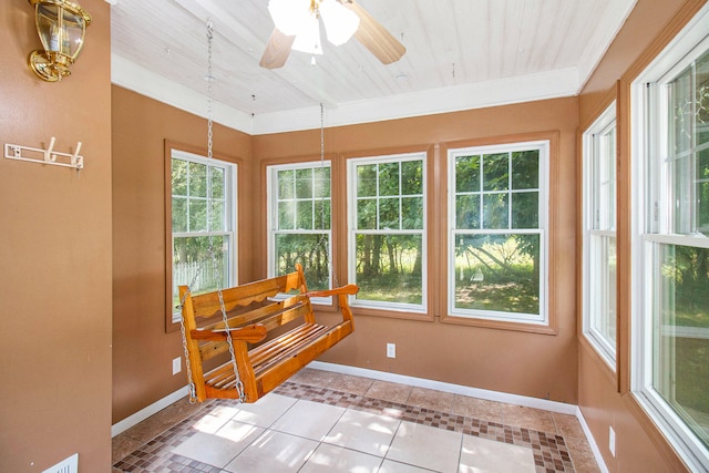 sunroom / solarium with ceiling fan and wood ceiling