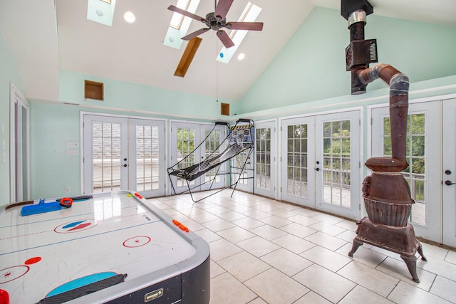 playroom featuring french doors, high vaulted ceiling, and a healthy amount of sunlight