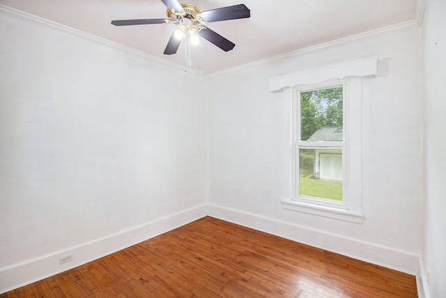 unfurnished room with hardwood / wood-style floors, ceiling fan, and ornamental molding