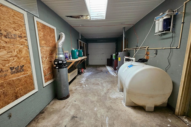 garage featuring gas water heater