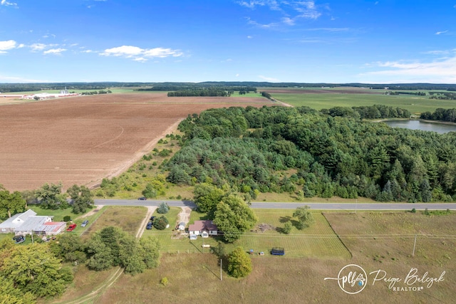 aerial view featuring a rural view and a water view