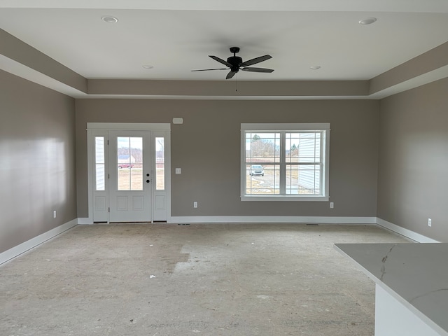 unfurnished room with ceiling fan