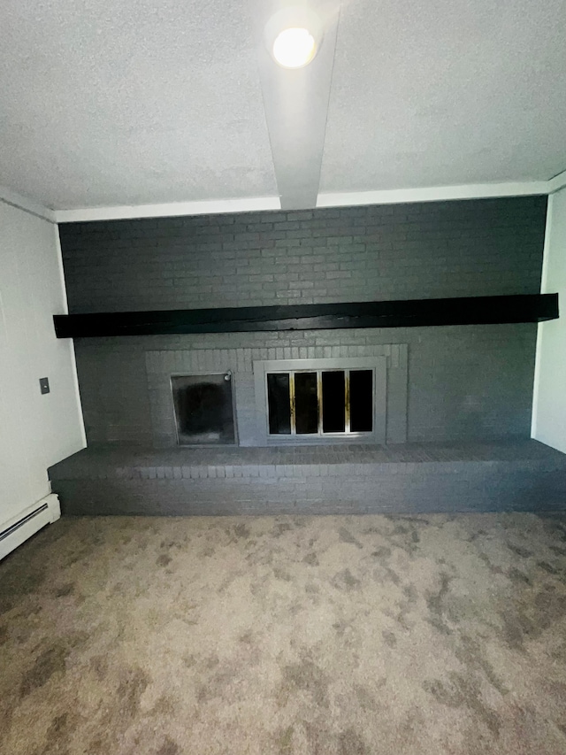 interior details with a textured ceiling, carpet floors, a brick fireplace, and baseboard heating