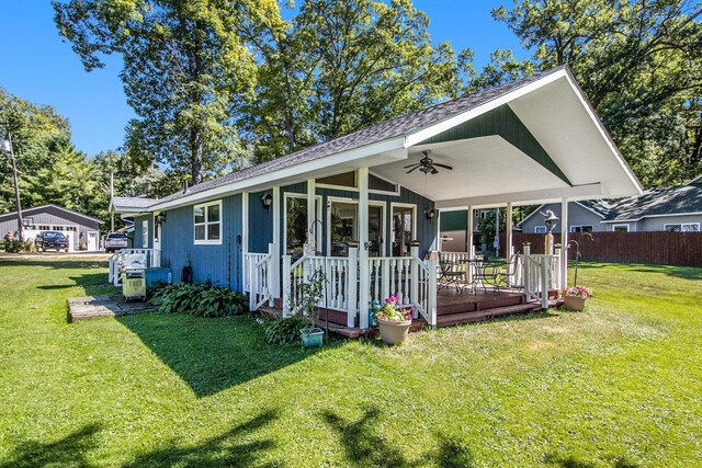 3055 E Baseline Rd, Gobles, MI 49055 - back of house featuring ceiling fan and a shingled roof