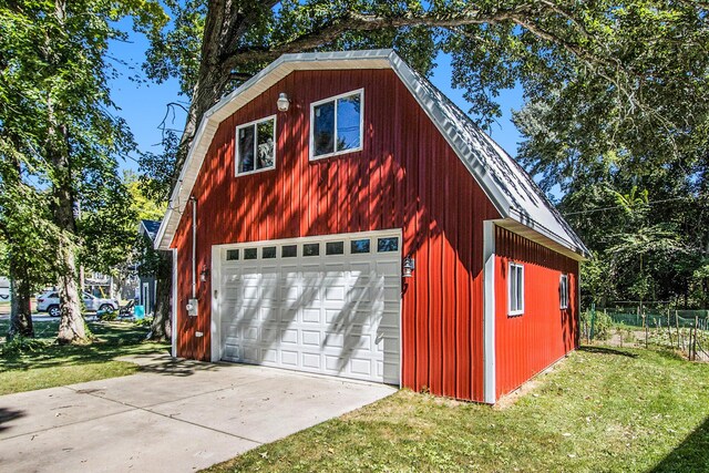 3055 E Baseline Rd, Gobles, MI 49055 - garage with a detached garage and driveway