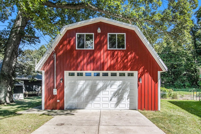 garage with a lawn