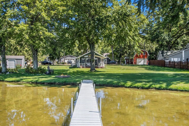 3055 E Baseline Rd, Gobles, MI 49055 - dock with a water view and view of scattered trees