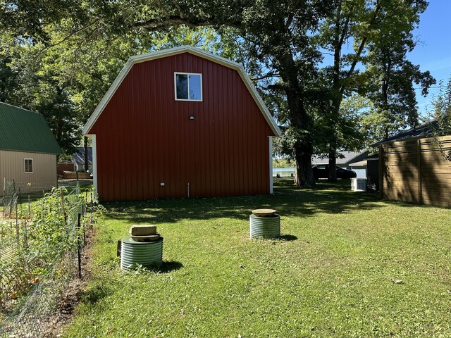 3055 E Baseline Rd, Gobles, MI 49055 - view of barn featuring a yard