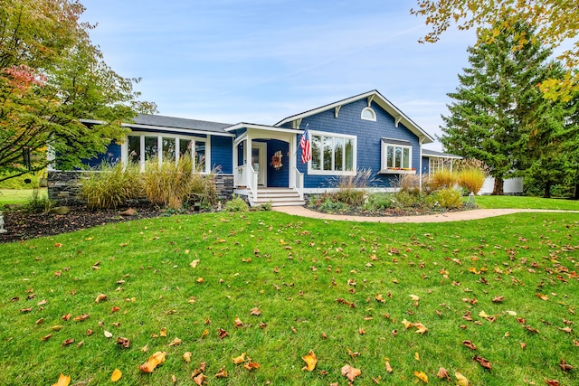 ranch-style house with a front yard