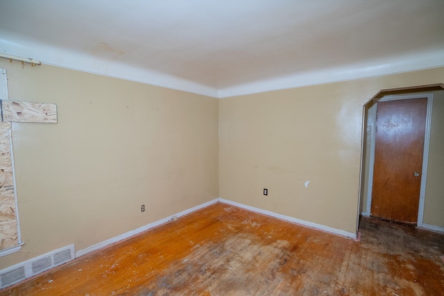 empty room featuring hardwood / wood-style floors