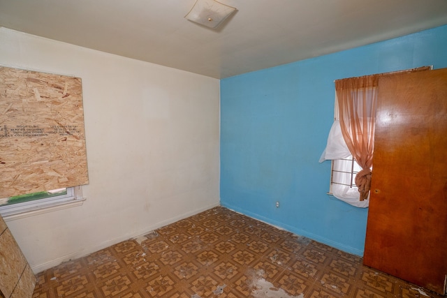 spare room featuring a wealth of natural light