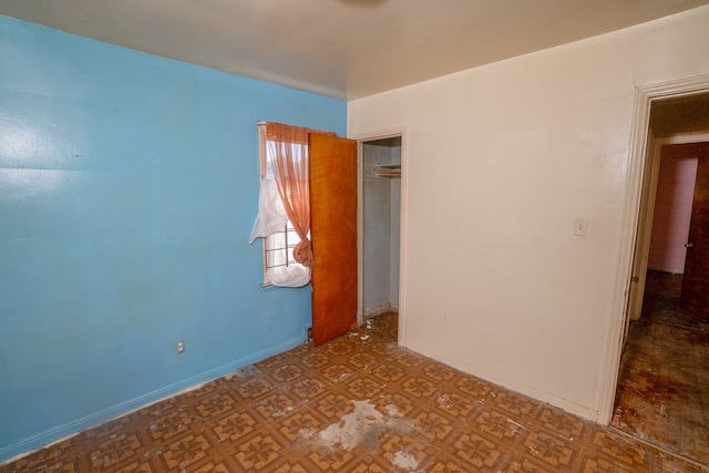 unfurnished bedroom featuring a closet