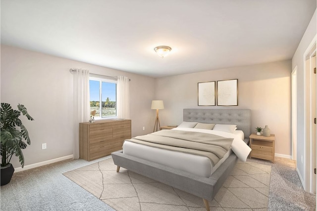 bedroom with light colored carpet