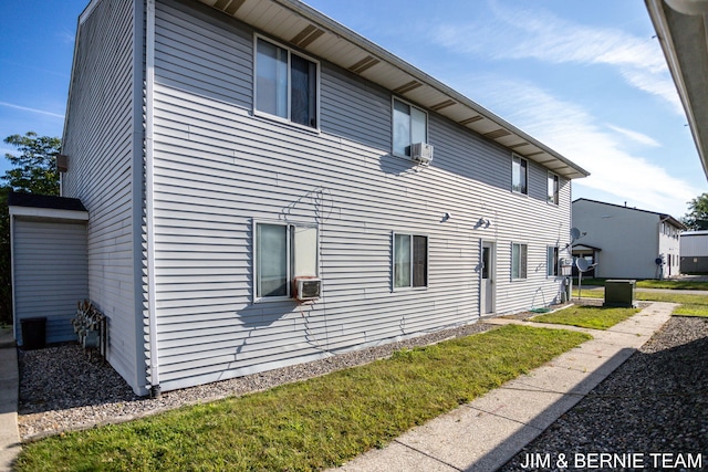 view of side of home with cooling unit