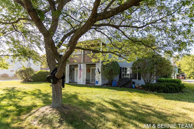 view of front of home with a front yard