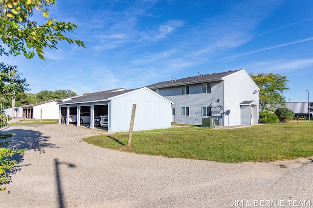 view of property exterior featuring a carport and a yard