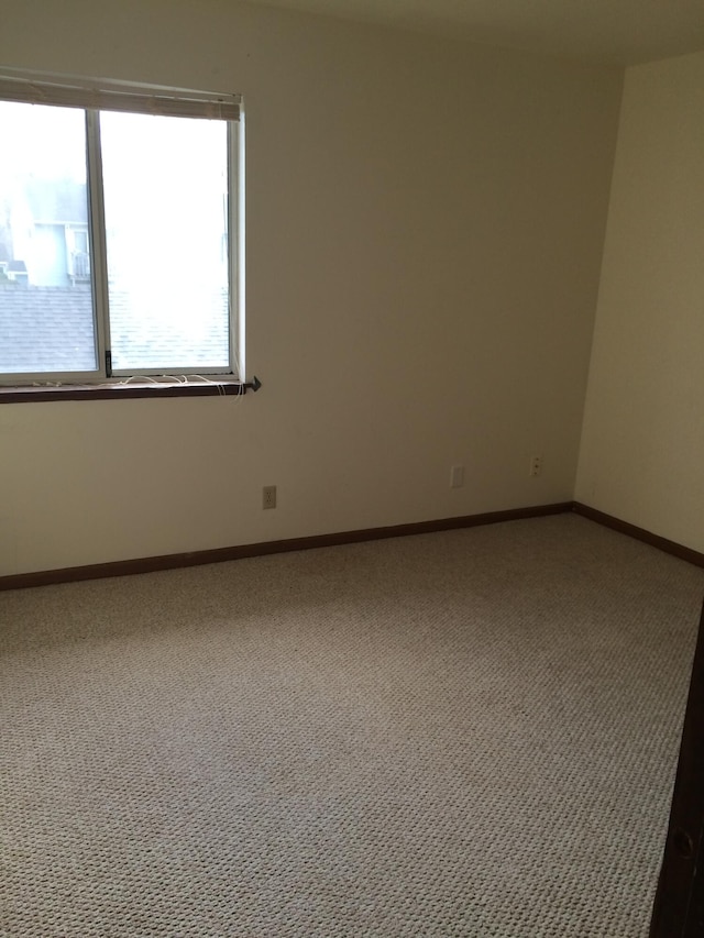 empty room with carpet floors