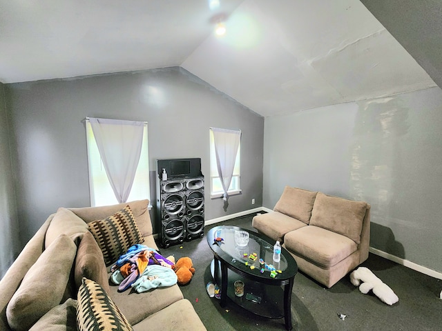 carpeted living room featuring lofted ceiling