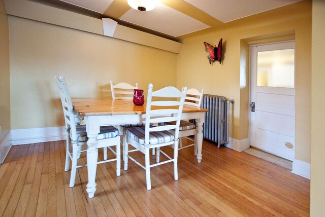260 Oak Island Dr, Wolverine Lake, MI 48390 - dining space with hardwood / wood-style floors and baseboards