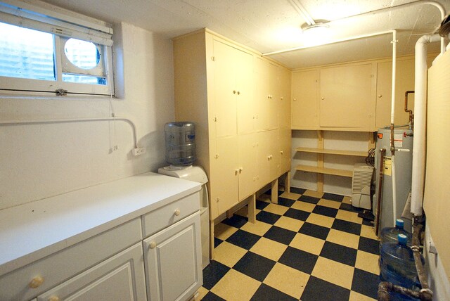 260 Oak Island Dr, Wolverine Lake, MI 48390 - below grade area with light floors and electric water heater