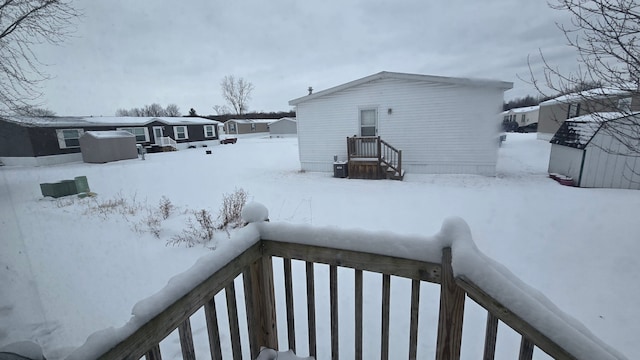 view of yard covered in snow