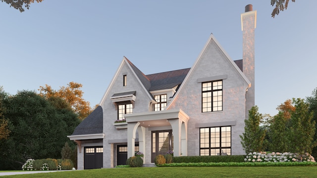 view of front of property with french doors and a front yard