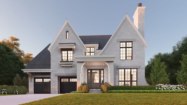 view of front of house with a front yard and french doors