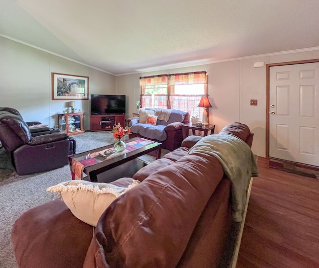 living room with hardwood / wood-style floors, lofted ceiling, and crown molding