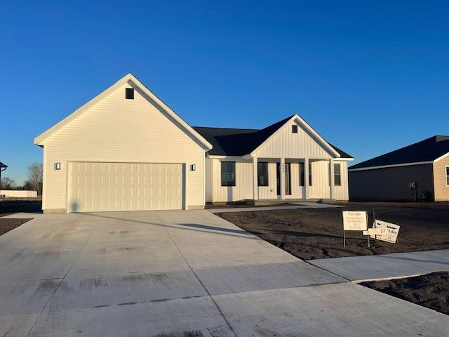 view of front of property with a garage