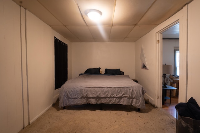 bedroom with a paneled ceiling