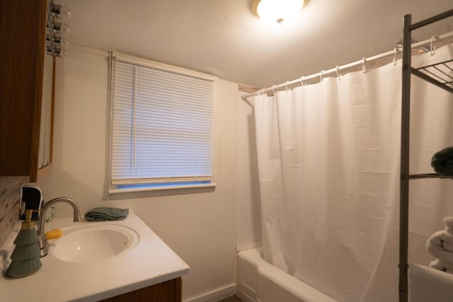 bathroom with vanity and shower / bath combination with curtain