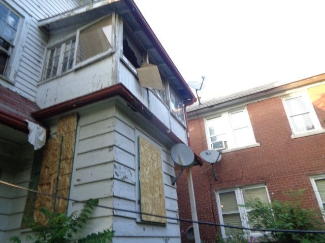 view of property exterior featuring a balcony