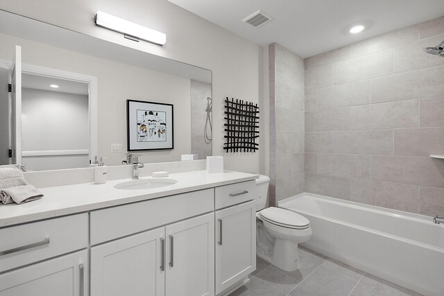 7464 Gramercy Cir Unit 19, West Bloomfield, MI 48322 - bathroom with vanity, toilet, tile patterned flooring, washtub / shower combination, and recessed lighting