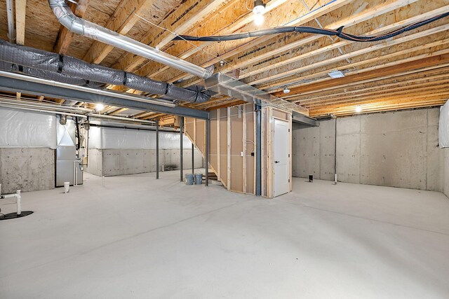 7464 Gramercy Cir Unit 19, West Bloomfield, MI 48322 - unfinished basement with heating unit